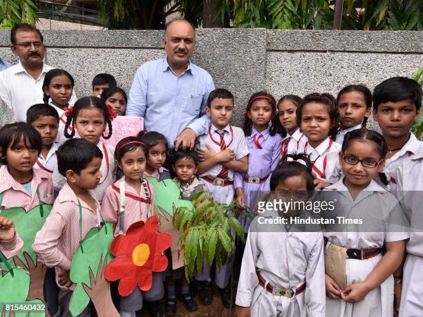 Chairperson Naresh Kumar during the plantation drive at Navyug School, Lodhi Colony, on July 15, 2017 in New Delhi, India. The New Delhi Municipal...