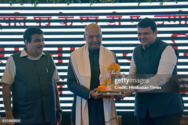 Maharashtra Chief Minister Devendra Fadnavis and Union Minister Nitin Gadkari greet NDA Presidential candidate Ramnath Kovind, at Garware Club,...