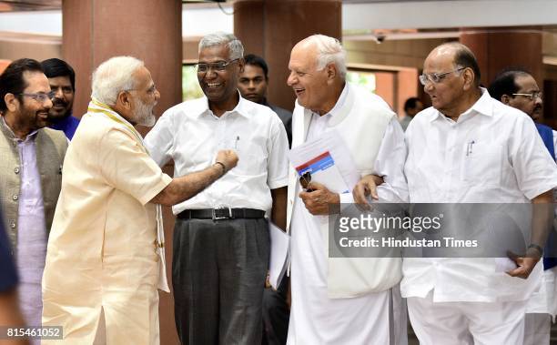 Prime Minister Narendra Modi with NCP Chief Sharad Pawar and President of National Conference Farooq Abdullah, CPI's D. Raja, Parliamentary Affairs...