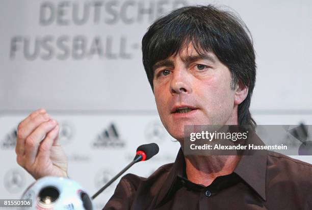 Joachim Loew, head coach of the German national team, talks to the media during a press conference of the German national team at the Centro Sportivo...