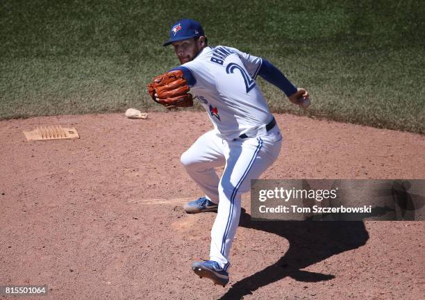Danny Barnes of the Toronto Blue Jays delivers a pitch in the eighth inning during MLB game action against the Houston Astros at Rogers Centre on...