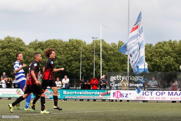 Mike Navajas Sanchez of XerxesDZB, Stanley Elbers of Excelsior, Wout Faes of Excelsior kijkt doelpunt na in de achtergrond de banner van Xerxesdzb...