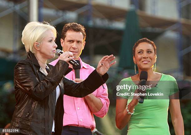 Singer Cyndi Lauper and hosts Chris Cuomo and Robin Roberts talk to the audience on ABC's "Good Morning America" on June 13, 2008 at Bryant Park in...