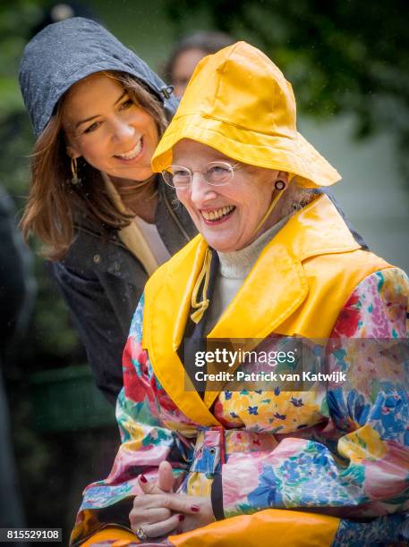 Queen Margrethe of Denmark and Crown Princess Mary of Denmark attend the Ringsted horse ceremony at Grasten Slot during their summer vacation on July...