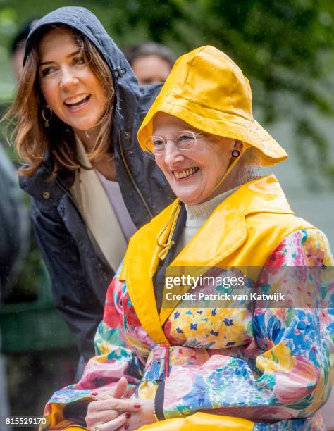 Queen Margrethe of Denmark and Crown Princess Mary of Denmark attend the Ringsted horse ceremony at Grasten Slot during their summer vacation on July...