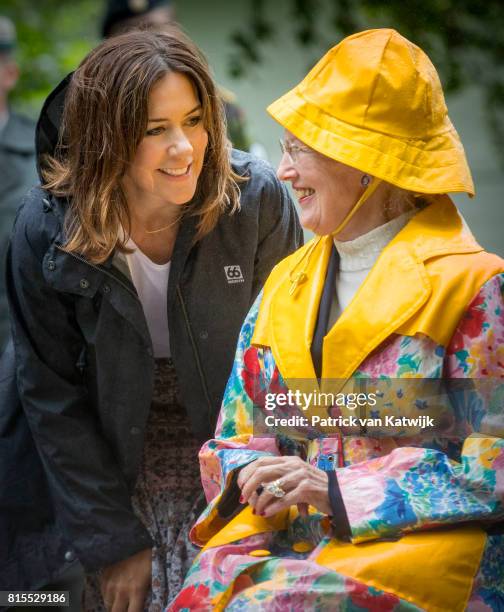 Queen Margrethe of Denmark and Crown Princess Mary of Denmark attend the Ringsted horse ceremony at Grasten Slot during their summer vacation on July...