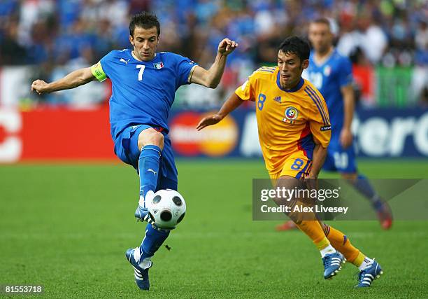 Alessandro Del Piero of Italy passes the ball in front of Paul Codrea of Romania during the UEFA EURO 2008 Group C match between Italy and Romania at...