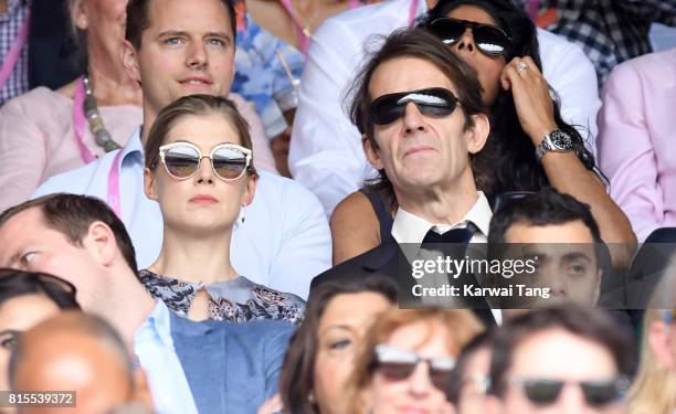 Rosamund Pike and Robie Uniacke attend Wimbledon 2017 as evian guests during day 13 on July 16, 2017 in London, England.