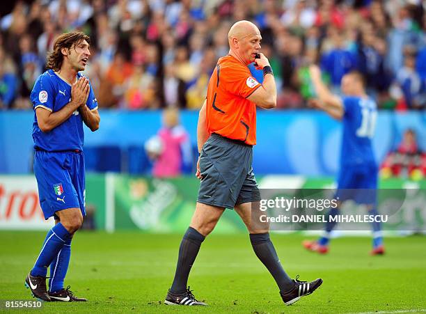 Italian midfielder Andrea Pirlo begs Norwegian referee Tom Henning during the Euro 2008 Championships Group C football match Italy vs. Romania on...