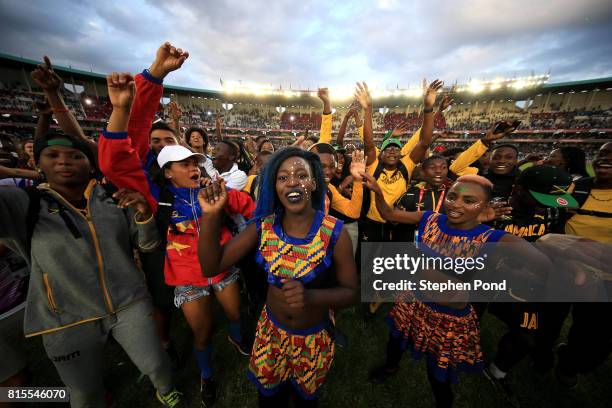 Athletes and volunteers join performers to dance during the closing ceremony on day five of the IAAF U18 World Championships on July 16, 2017 in...