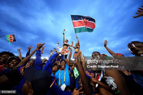 Athletes and volunteers join performers to dance during the closing ceremony on day five of the IAAF U18 World Championships on July 16, 2017 in...