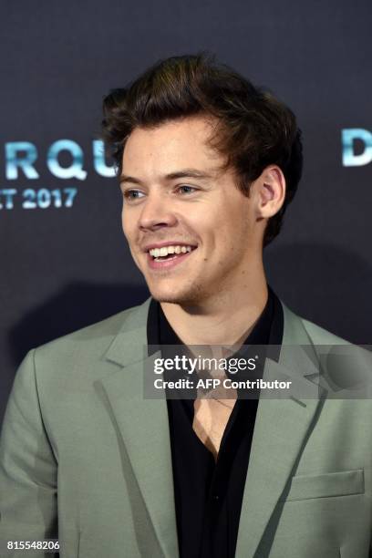 British singer, songwriter and actor Harry Styles poses on July 16 during a photo-call at the cinema Ocine in Dunkirk, for the premier of the movie...