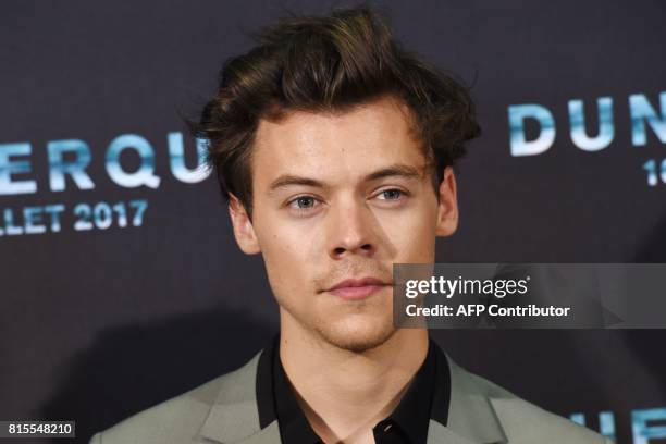 British singer, songwriter and actor Harry Styles poses on July 16 during a photo-call at the cinema Ocine in Dunkirk, for the premier of the movie...
