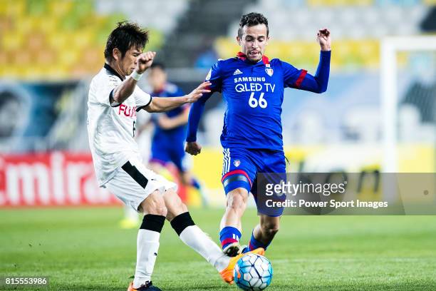 Suwon Midfielder Damir Sovsic fights for the ball with Kawasaki Kawasaki Midfielder Tasaka Yusuke during the AFC Champions League 2017 Group G match...