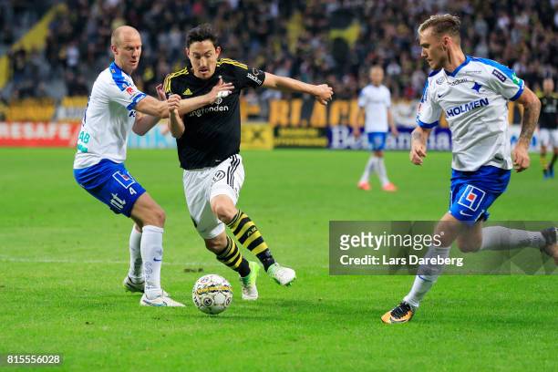 Andreas Johansson of IFK Norrkoping and Stefan Ishizaki of AIK during the Allsvenskan match between AIK and IFK Norrkoping at Friends arena on July...