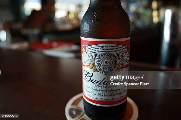 Bottle of Budweiser beer is displayed at a bar June 13, 2008 in New York City. The Belgian-Brazilian brewer InBev has made an offer of $46.3 billion...