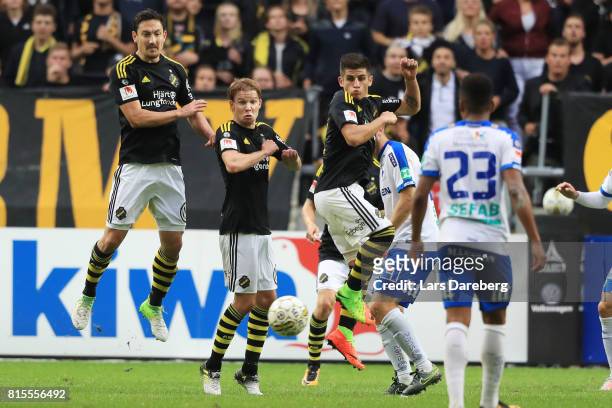 Stefan Ishizaki, Johan Blomberg and Nicolas Stefanelli of AIK during the Allsvenskan match between AIK and IFK Norrkoping at Friends arena on July...