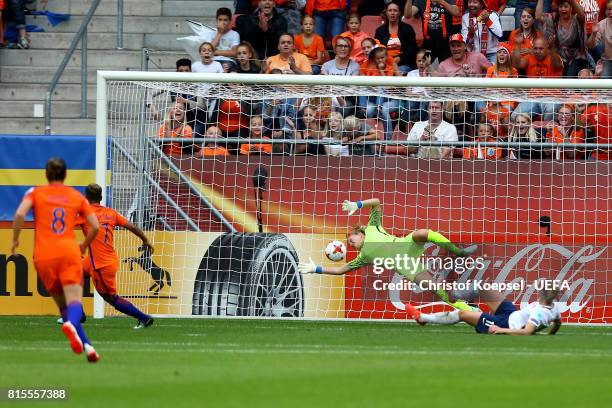 Shanice van de Sanden of the Netherlands ( scores the first goal against Ingrid Hjelmseth of Norway during the UEFA Women's Euro 2017 Group A match...