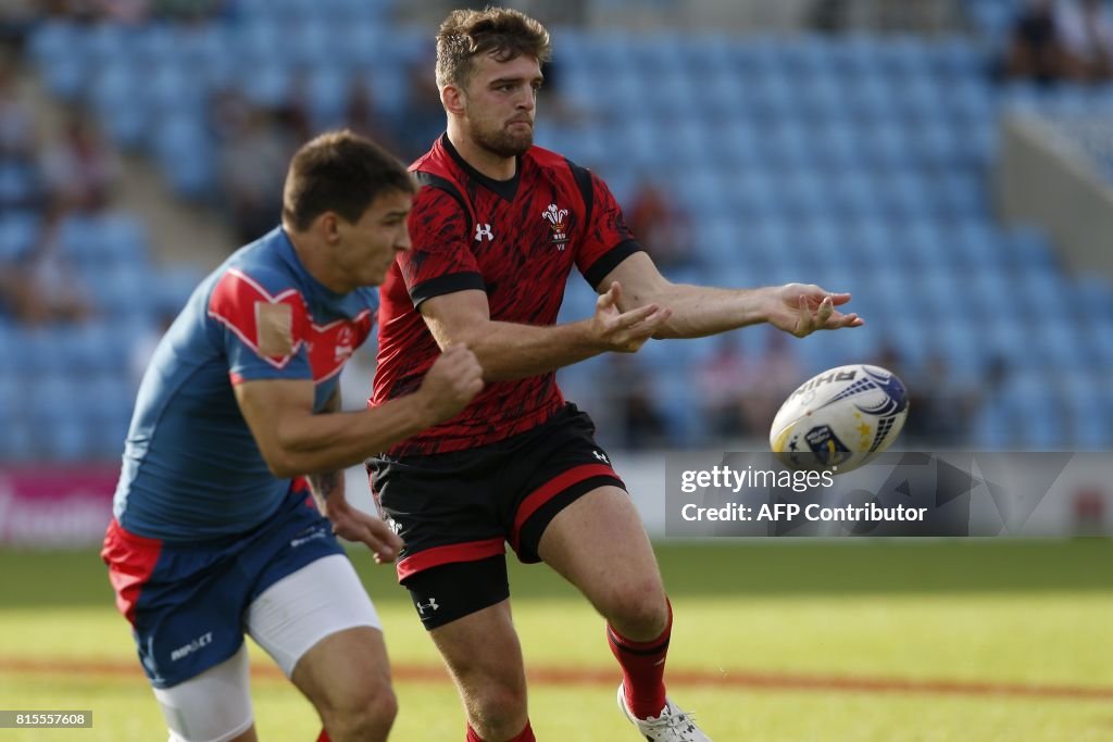 Rus Rugby Exeter Wales' Ben Roach passes the ball during the rugby union sevens Cup ...