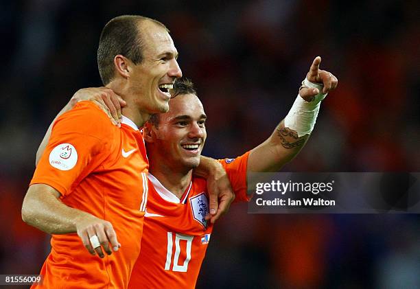 Wesley Sneijder of Netherlands celebrates with Arjen Robben after scoring his teams fourth goal during the UEFA EURO 2008 Group C match between...