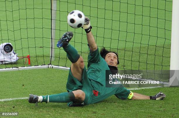 Italian goalkeeper Gianluigi Buffon saves a penalty shot by Romanian forward Adrian Mutu during the Euro 2008 Championships Group C football match...