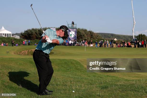 Callum Shinkwin of England hits his second shot on the 17th hole during the final round of the AAM Scottish Open at Dundonald Links Golf Course on...