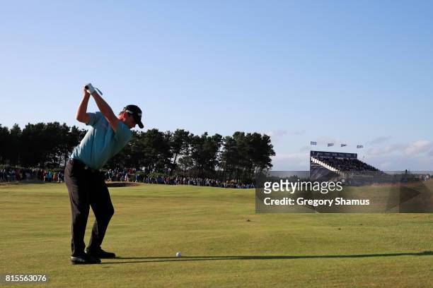 Callum Shinkwin of England hits his second shot on the 18th hole during the final round of the AAM Scottish Open at Dundonald Links Golf Course on...