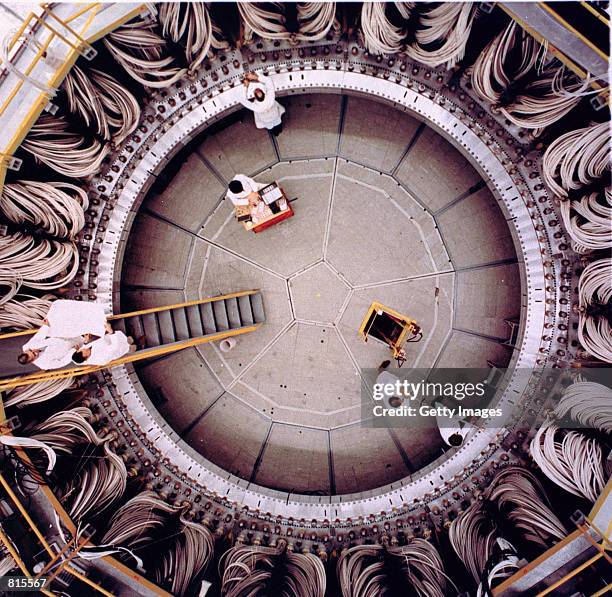 View of inside Los Alamos National Laboratory as researchers work on a nuclear testing project in 1974. The FBI believes China had miniaturized its...