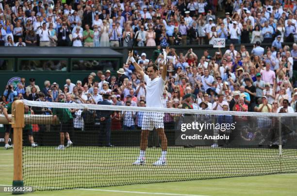 Roger Federer of Switzerland celebrates after beating Marin Cilic of Croatia in the men's final of the 2017 Wimbledon Championships at the All...