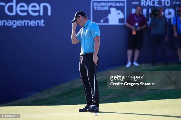 Callum Shinkwin of England reacts to a missed putt on the 18th green during the final round of the AAM Scottish Open at Dundonald Links Golf Course...
