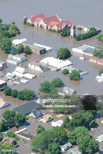 An aerial image of downtown shows flood-affected areas June 13, 2008 in Cedar Rapids, Iowa. Flooding along the Cedar River was expected to crest...