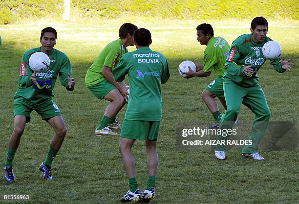 Bolivian footballers Ricardo Pedriel, Miguel Hoyos, Luis Mendez, Luis Gatty Riveiro and Ronald Garcia take part in a training session of the national...