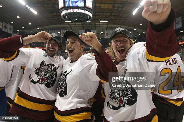 Members of the Chicago Wolves celebrate a championship win over the Wilkes-Barre/Scranton Penguins during the Calder Cup Finals on June 10, 2008 at...