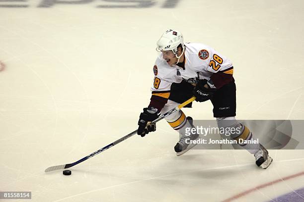 Bryan Little of the Chicago Wolves handles the puck against the Wilkes-Barre/Scranton Penguins during the Calder Cup Finals on June 10, 2008 at the...