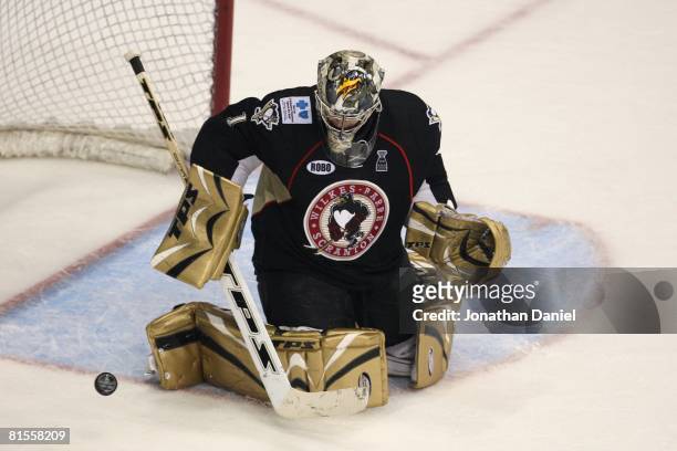 Goaltender John Curry of the Wilkes-Barre/Scranton Penguins blocks the puck against the Chicago Wolves during the Calder Cup Finals on June 10, 2008...