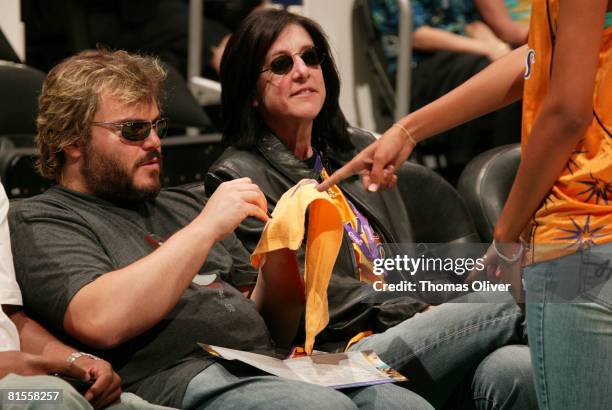 Actor Jack Black signs autographs for fans while the Connecticut Sun take on the Los Angeles Sparks at Staples Center on June 13, 2008 in Los...