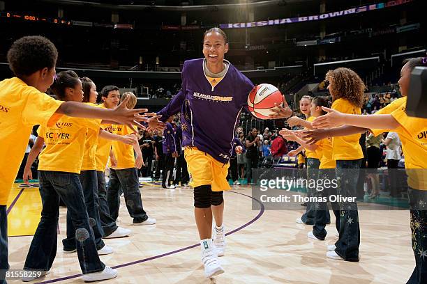 Kiesha Brown of the Los Angeles Sparks takes the court before the game against the Connecticut Sun at Staples Center on June 13, 2008 in Los Angeles,...