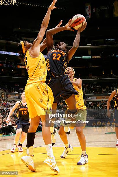 Barbara Turner of the Connecticut Sun goes up for a shot against Candace Parker of the Los Angeles Sparks at Staples Center on June 13, 2008 in Los...