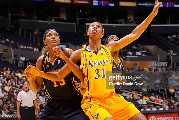 Jessica Moore of the Los Angeles Sparks boxes out on Asjha Jones of the Connecticut Sun at Staples Center on June 13, 2008 in Los Angeles,...