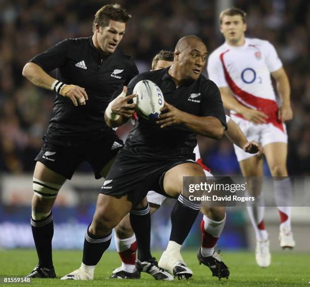 Neemia Tialata of the All Blacks runs with the ball during the First Iveco Series Test match between the New Zealand All Blacks and England at Eden...