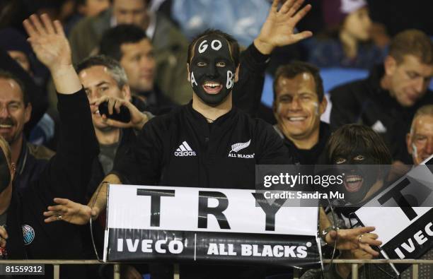 All Black fans celebrate a try during the First Iveco Series Test match between New Zealand All Blacks and England at Eden Park on June 14, 2008 in...