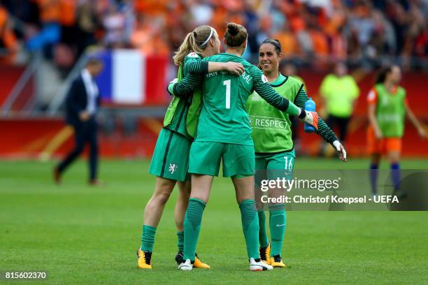 Loes Geurts, Sari van Veenendaal and Angela Christ of the Netherlands celebrata afetr winning the UEFA Women's Euro 2017 Group A match between...