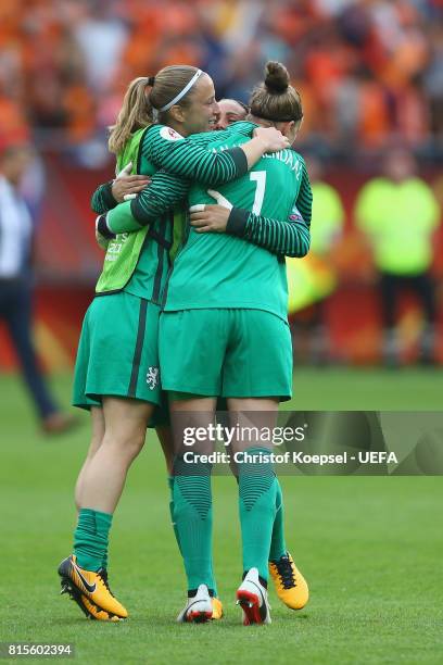 Loes Geurts, Sari van Veenendaal and Angela Christ of the Netherlands celebrata afetr winning the UEFA Women's Euro 2017 Group A match between...