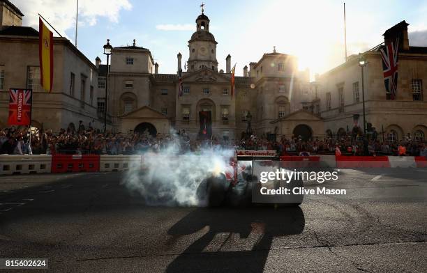 Sebastian Vettel of Germany and Ferrari driving the Scuderia Ferrari SF15-T during F1 Live London at Trafalgar Square on July 12, 2017 in London,...