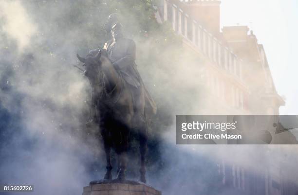 Tyre smoke engulfs a statue on Whitehall during F1 Live London at Trafalgar Square on July 12, 2017 in London, England. F1 Live London, the first...