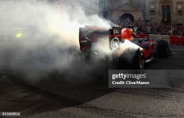 Daniel Ricciardo of Australia and Red Bull Racing driving the Red Bull Racing RB7 during F1 Live London at Trafalgar Square on July 12, 2017 in...