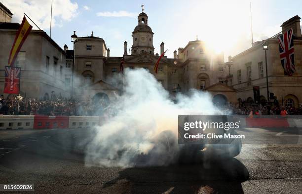 Sebastian Vettel of Germany and Ferrari driving the Scuderia Ferrari SF15-T during F1 Live London at Trafalgar Square on July 12, 2017 in London,...