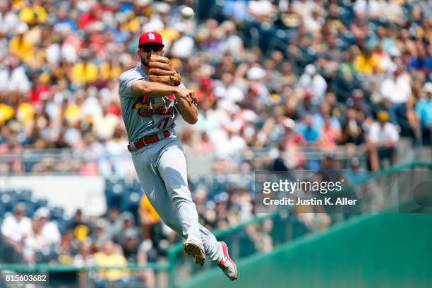Paul DeJong of the St. Louis Cardinals records a put out in the second inning against the Pittsburgh Pirates at PNC Park on July 16, 2017 in...