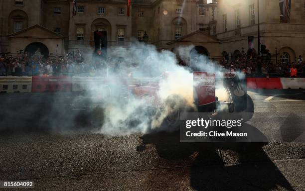 Sebastian Vettel of Germany and Ferrari driving the Scuderia Ferrari SF15-T during F1 Live London at Trafalgar Square on July 12, 2017 in London,...