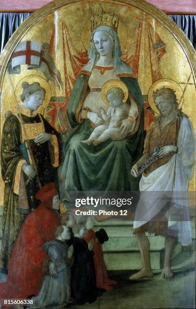 Fra Filippp Lippi Italian. Madonna del Ceppo. Virgin and Child enthroned, flanked by St John the Baptist and another saint, with donor and family...